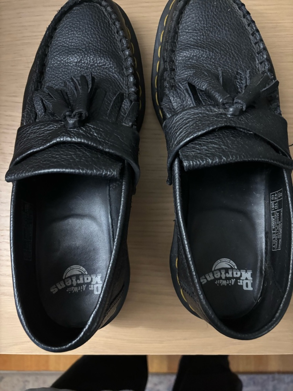 Dr. Martens Black Leather Tassel Penny Loafers with Yellow Welt Stitching